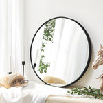 Okrągłe lustro ścienne z czarną metalową ramą 61 cm