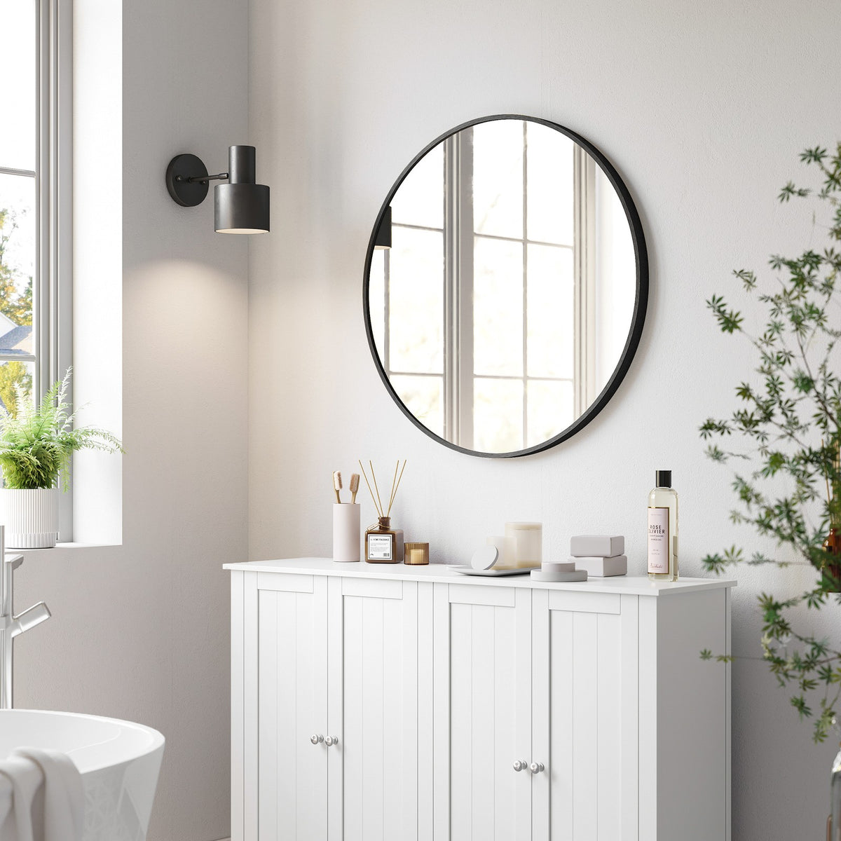 Okrągłe lustro ścienne z czarną metalową ramą 61 cm