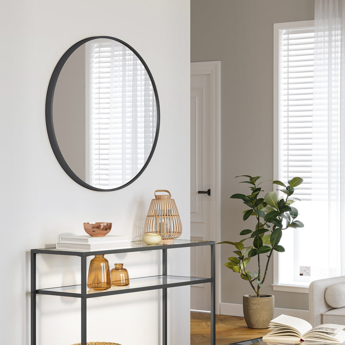 Okrągłe lustro ścienne z czarną metalową ramą 61 cm